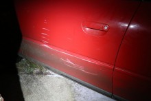 Pijany wyjechał autem z cudzego garażu. Zaczepił za ogrodzenie i budynek